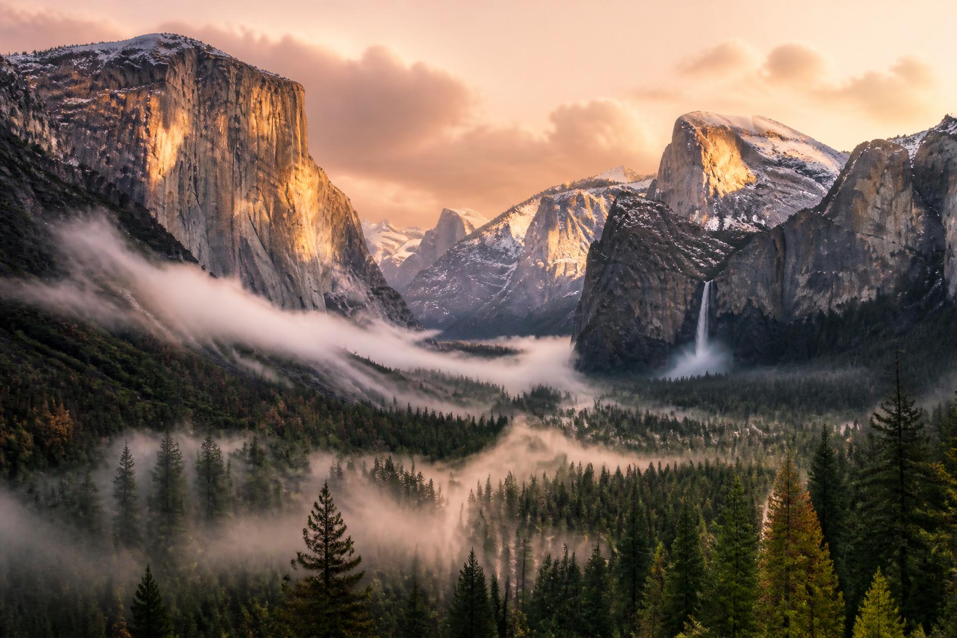 Yosemite Valley at sunrise with El Capitan and Half Dome above the mist
